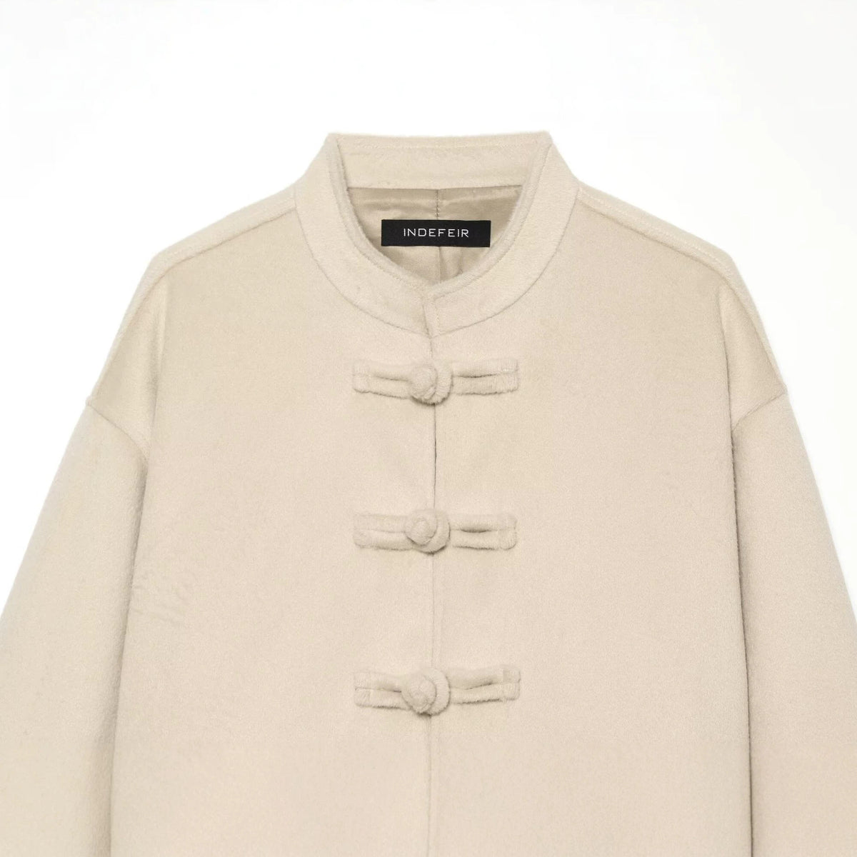 Casual and minimalist knot and loop woolen coat for women