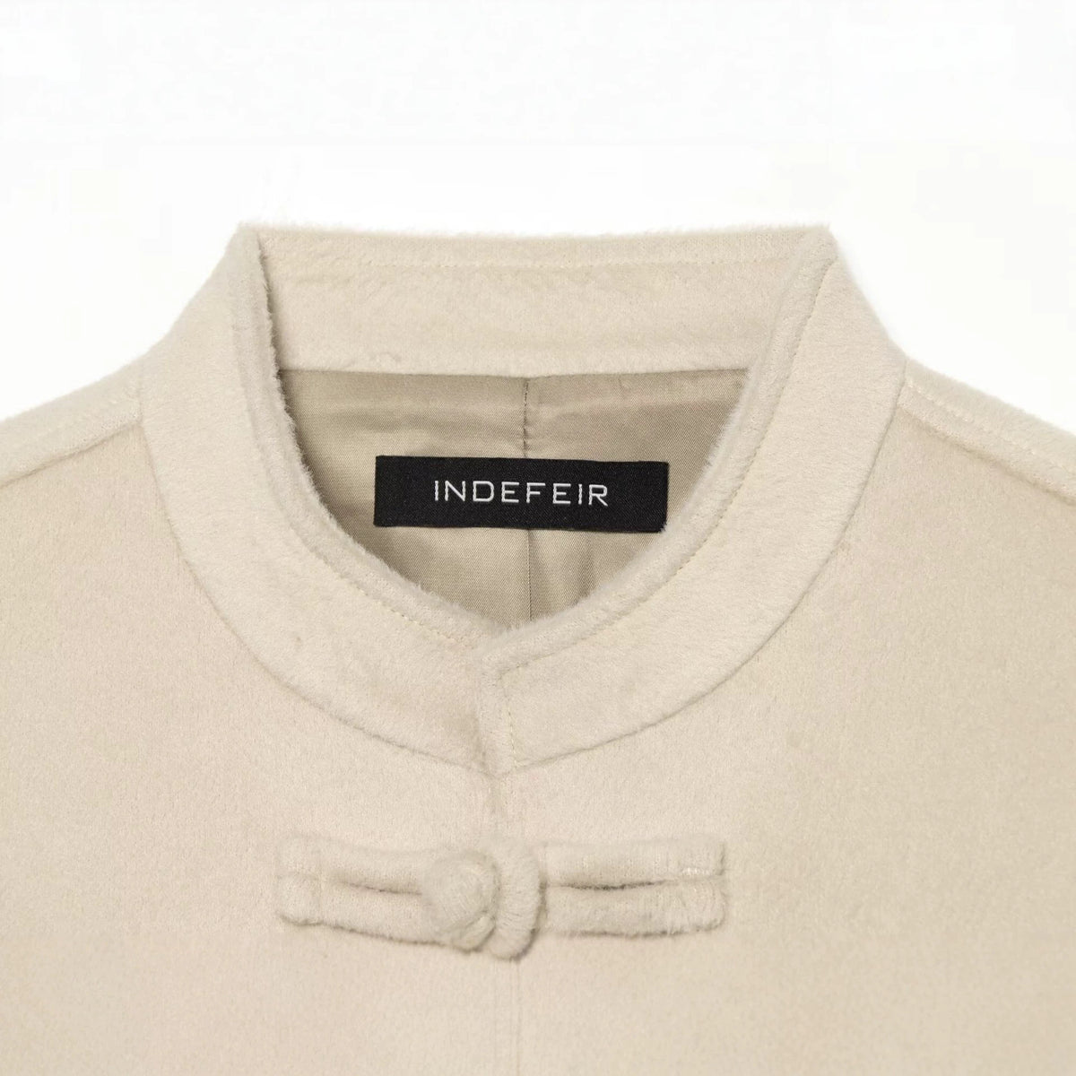Casual and minimalist knot and loop woolen coat for women